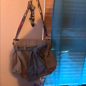 Fabric tan bag with adjustable cloth handle